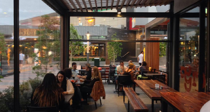 Outdoor café with Ziptrak blinds