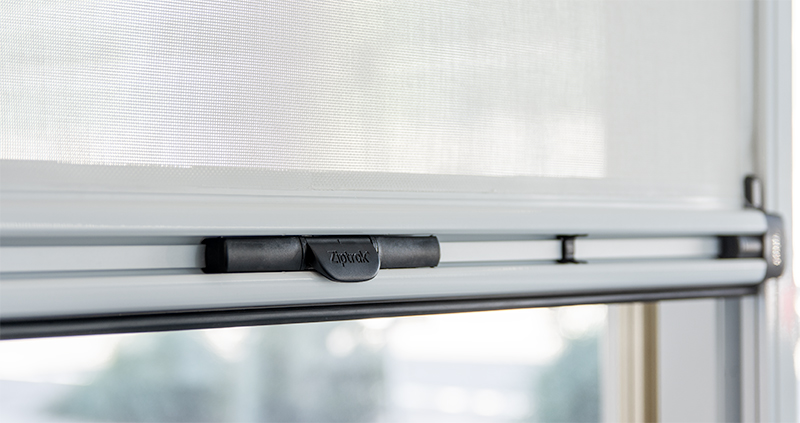 Ziptrak centre lock release handle